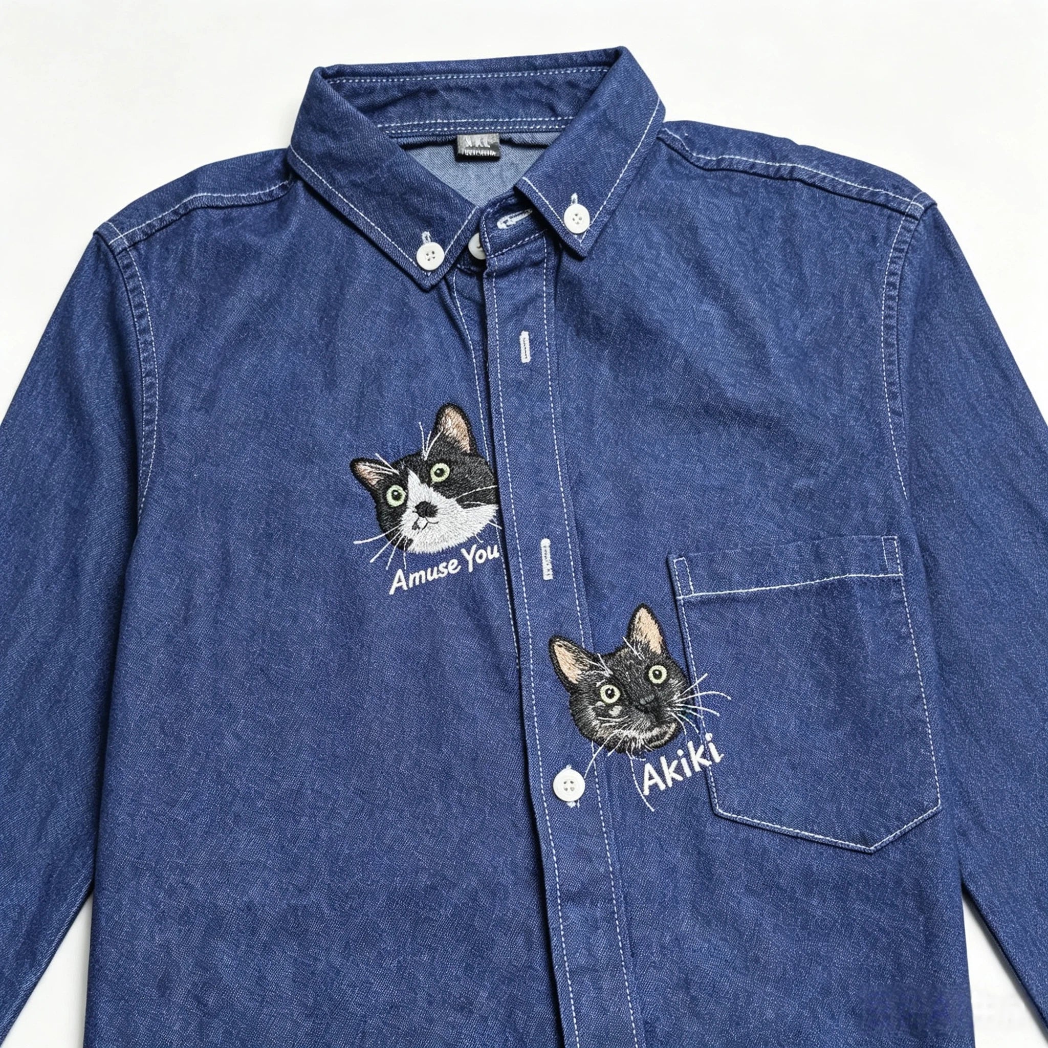 Custom Pet Long-Sleeve Denim Shirt: Featuring a hand-sewn portrait on washed denim, customized from your pet's photo. A perfect way to wear your furry bestie with you everywhere.