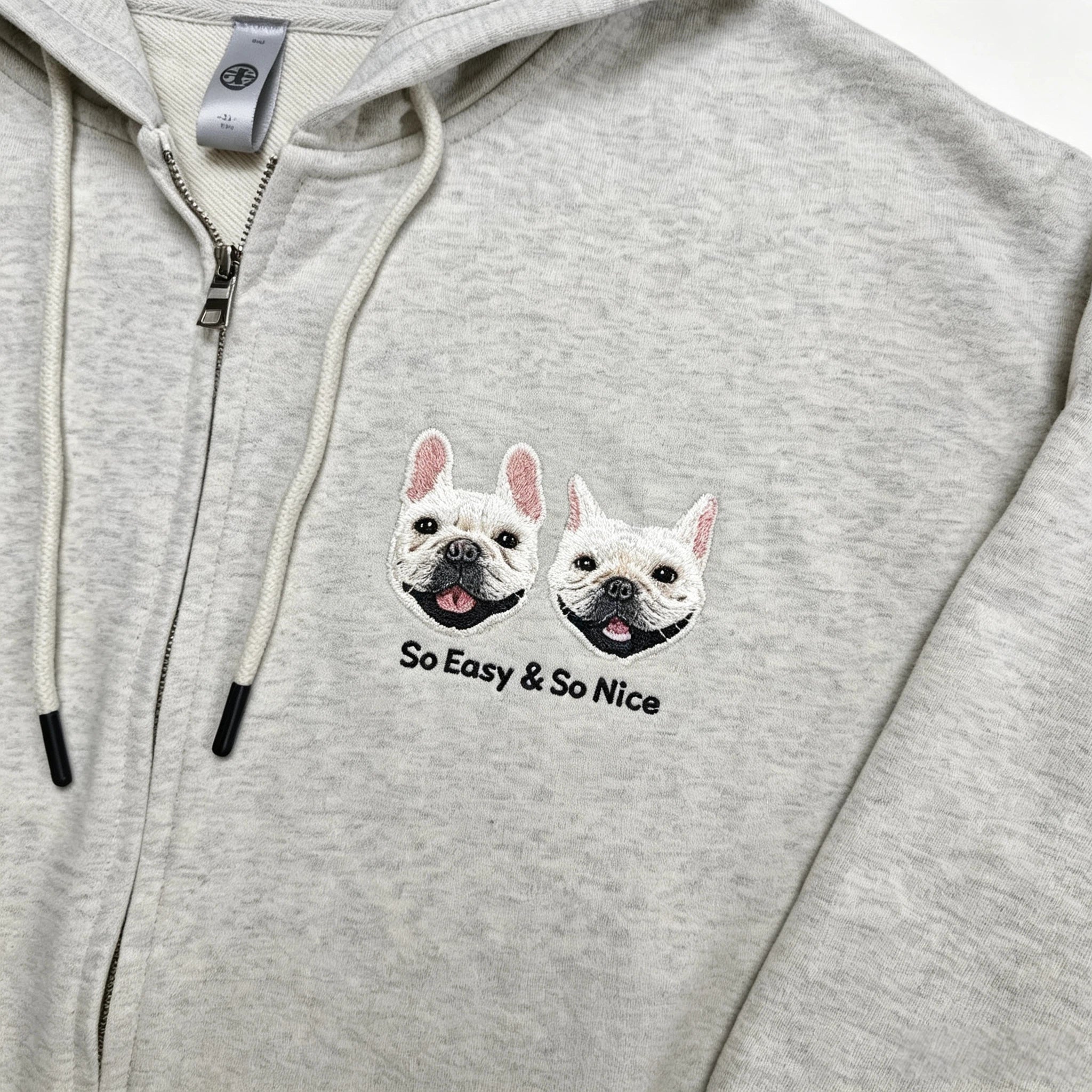 Zip-Up Hoodie: Hand-stitched pet portraits. Fully customized from your pet's real photos. The delicate stitching perfectly captures your furry friend's unique gaze, fur texture, and facial features—wear your cherished memories.